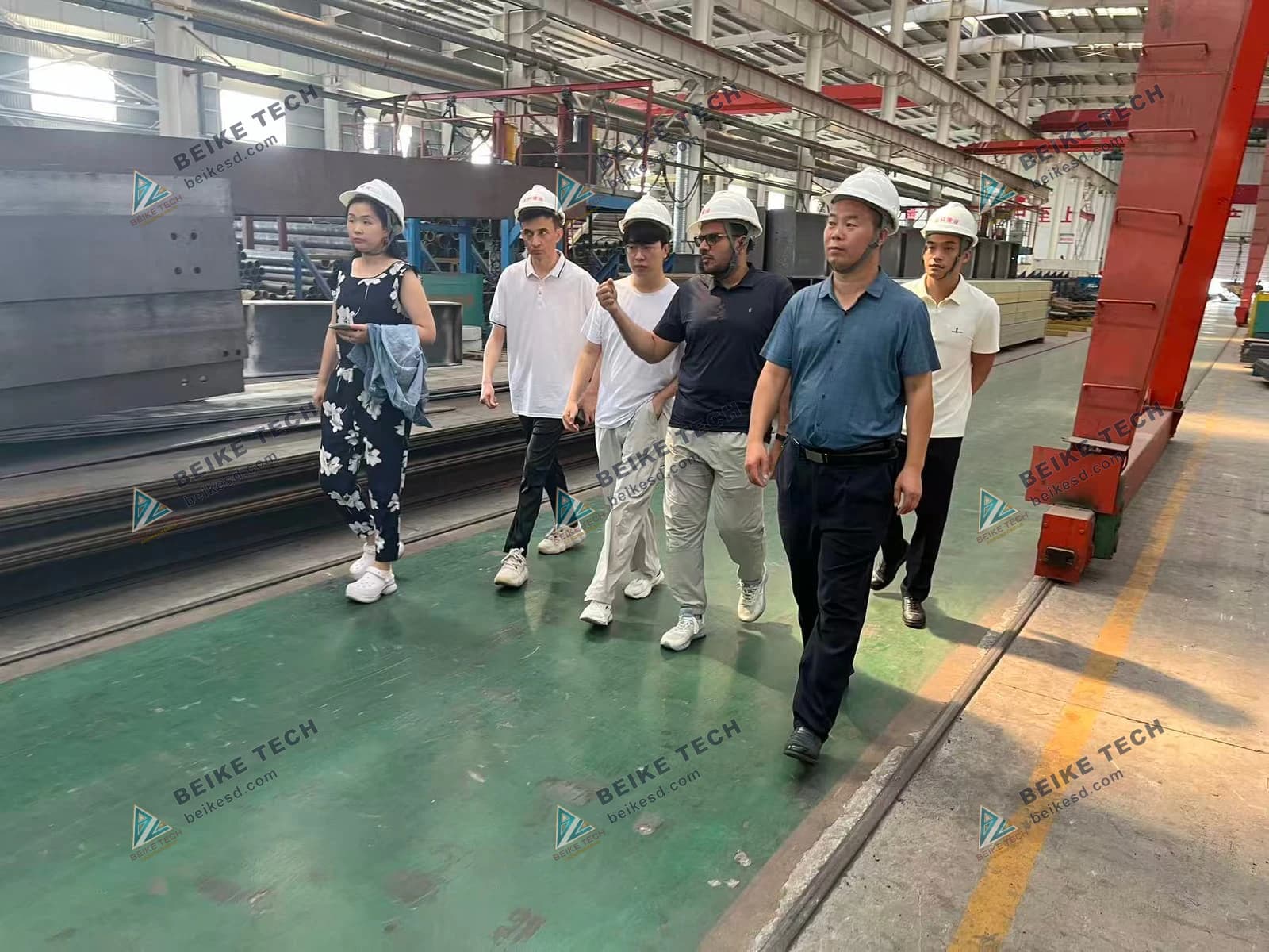 Foreign customer delegation visiting factory workshop